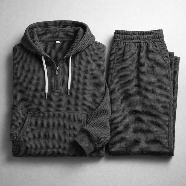 Men's fashionable textured lounge set, complete with a cozy hoodie and matching relaxed-fit joggers.
