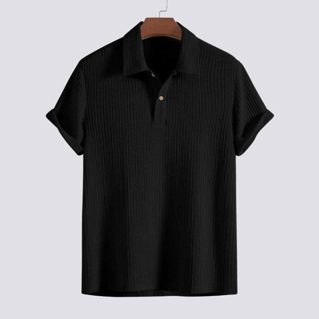 Close-up of the textured men's waffle knit polo shirt fabric, highlighting its softness for casual wear.