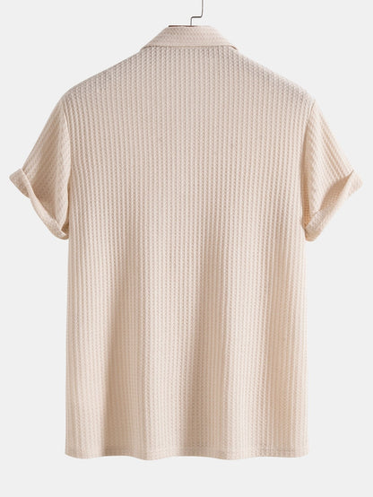 Front view of a classic men's waffle knit polo shirt, a comfortable and stylish fashion top for any occasion.