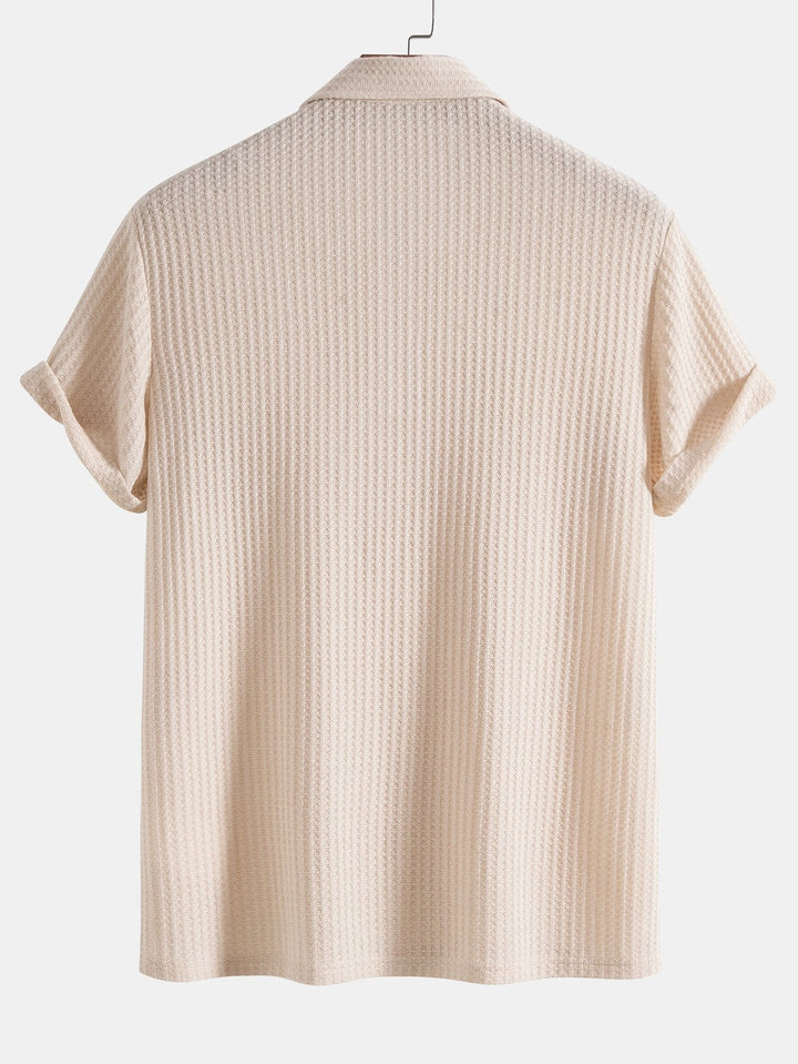Front view of a classic men's waffle knit polo shirt, a comfortable and stylish fashion top for any occasion.