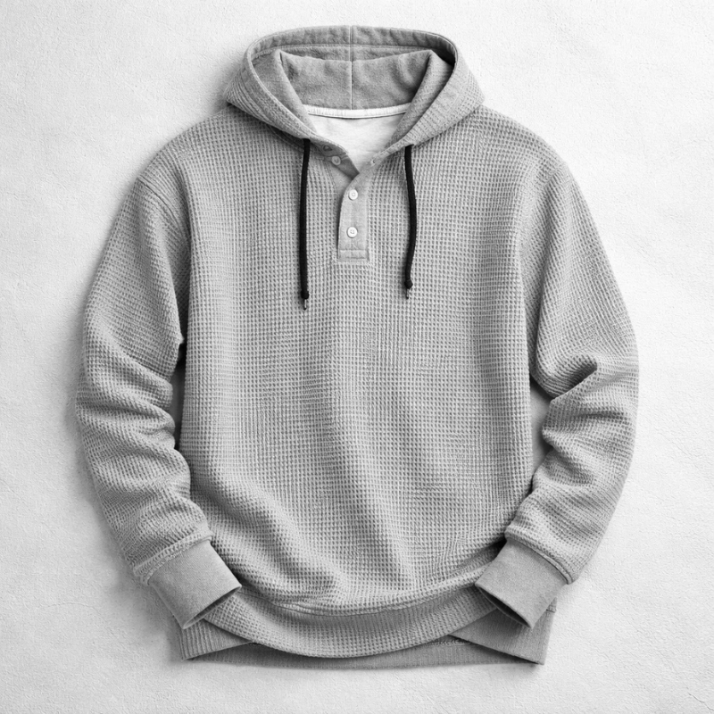 Stylish men's waffle knit pullover hoodie, offering a comfortable, tailored fit for versatile casual wear.