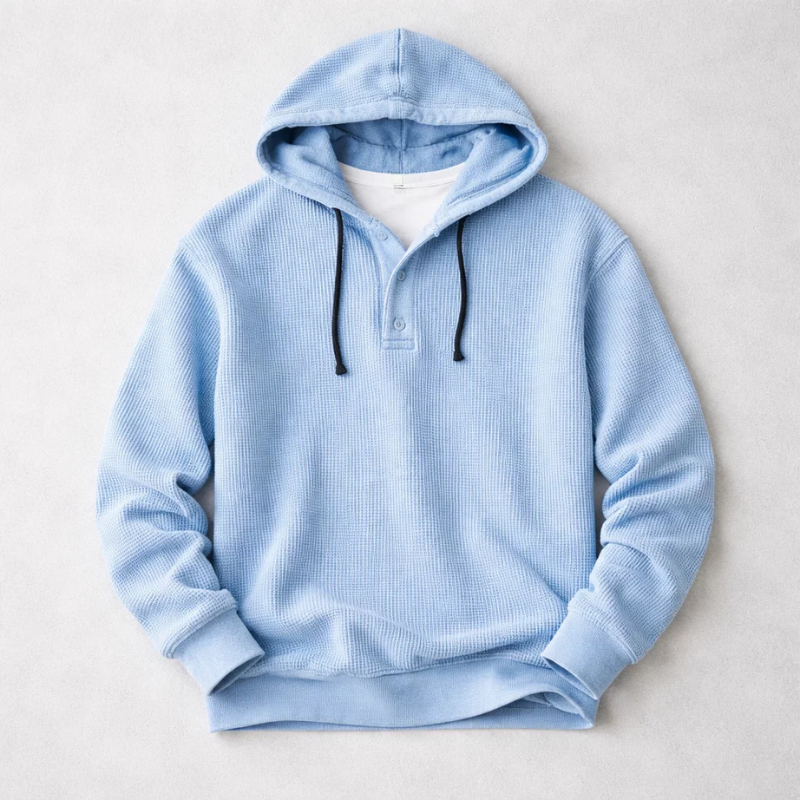 Back view of a men's waffle knit pullover hoodie, showcasing its comfortable, tailored fit for fall fashion.