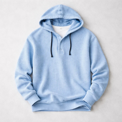Back view of a men's waffle knit pullover hoodie, showcasing its comfortable, tailored fit for fall fashion.