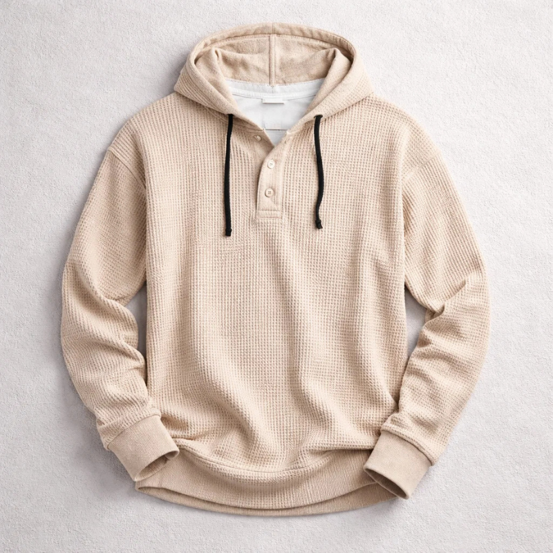 Cozy men's waffle knit pullover hoodie, ideal for layering and comfortable everyday fall and winter apparel.