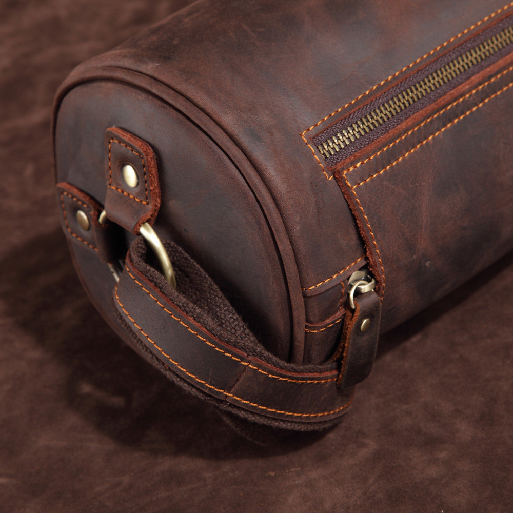 Men's Cooper brown leather messenger bag with a laptop & documents inside, a true work bag.