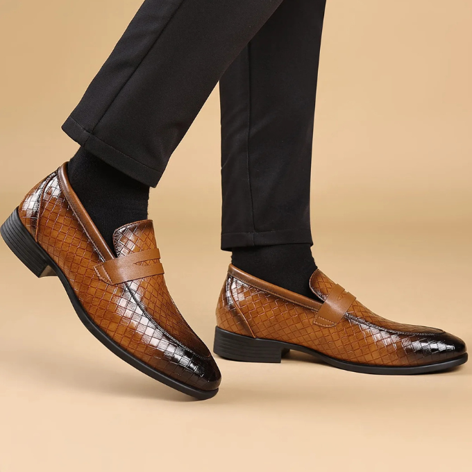 Top view of classic men's Corté woven slip-on loafers, polished and ready for wear.