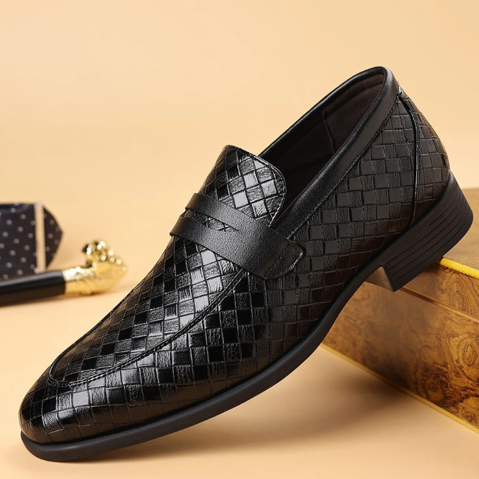 Rear view of men's Corté woven slip-on loafers, highlighting polished heel and quality craftsmanship.