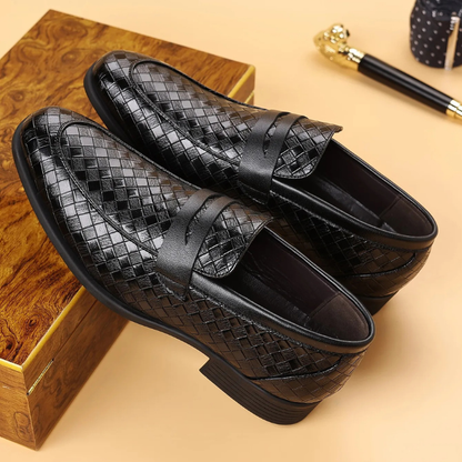 Stack of versatile men's Corté woven slip-on loafers, comfortable and polished.