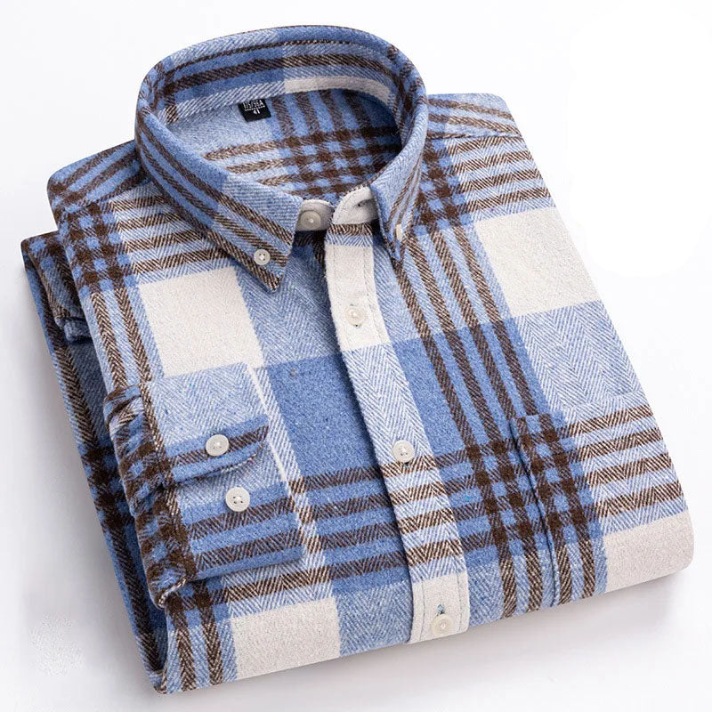 Detail of button down collar and buttons on a men's cozy brushed flannel shirt, stylish and warm.