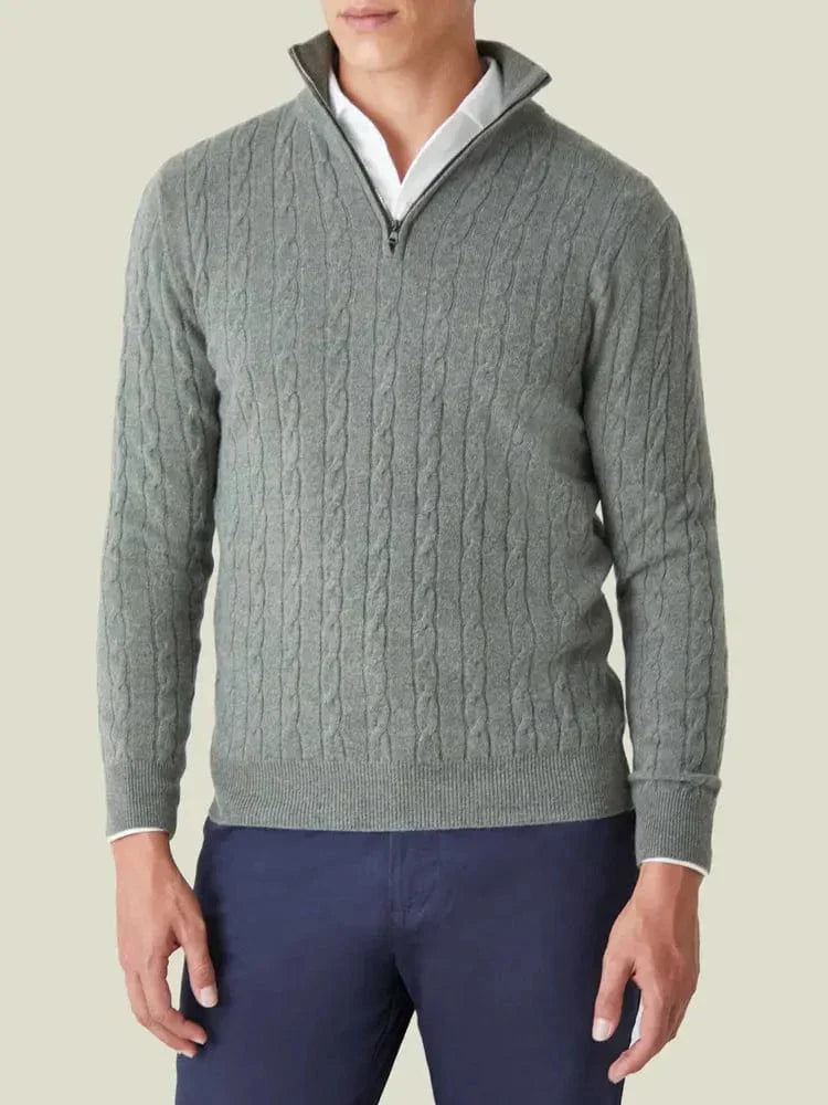 Man wearing a fashionable cable knit half-zip jumper, showcasing its comfy, smart casual men's style.