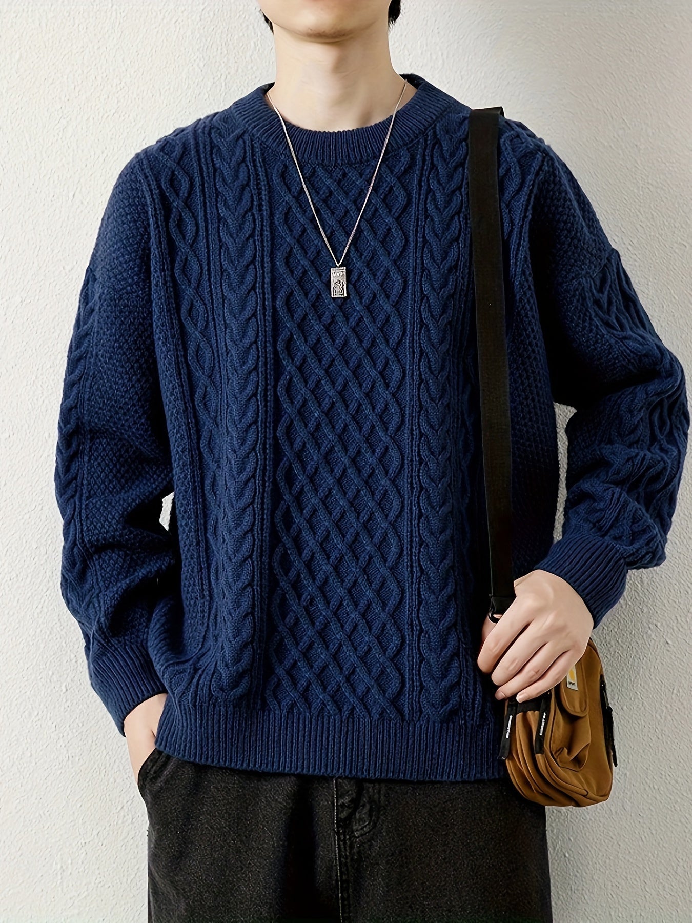 Men's classic cable knit jumper, providing warmth & stylish casual appeal.