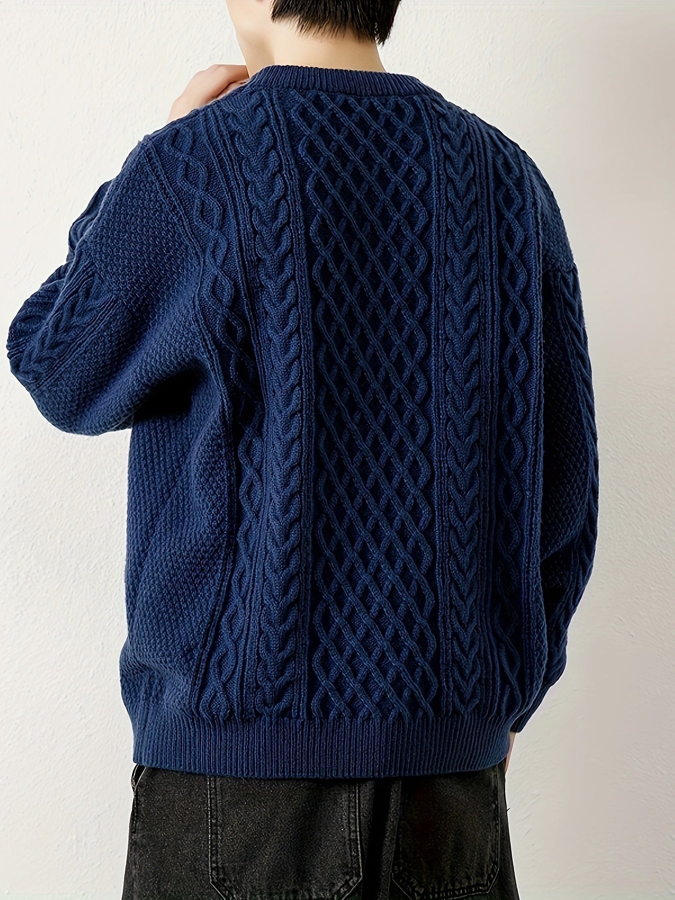 Comfortable men's cable knit sweater, an ideal pullover for cold weather.