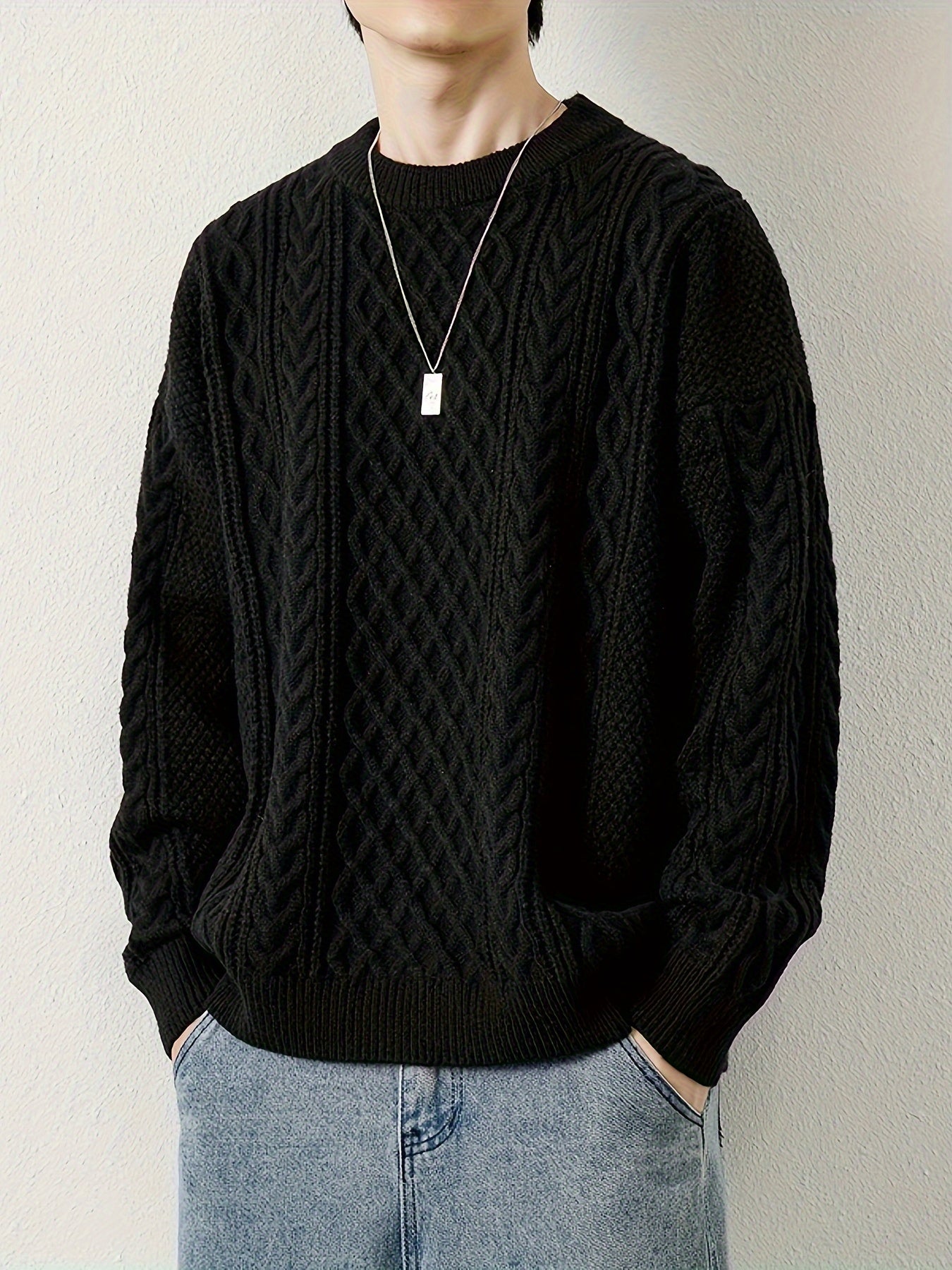 Everyday men's cable knit jumper, offering coziness and winter style.