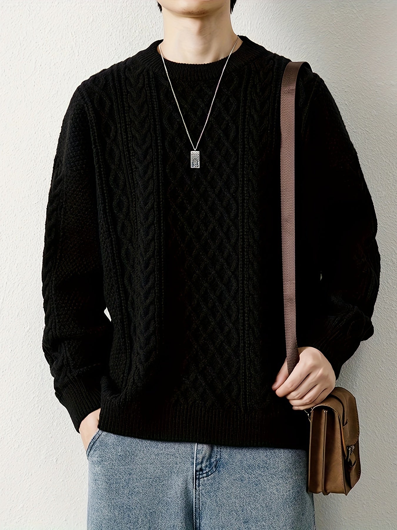 Men's classic cable knit sweater, a comfortable pullover for casual winter days.