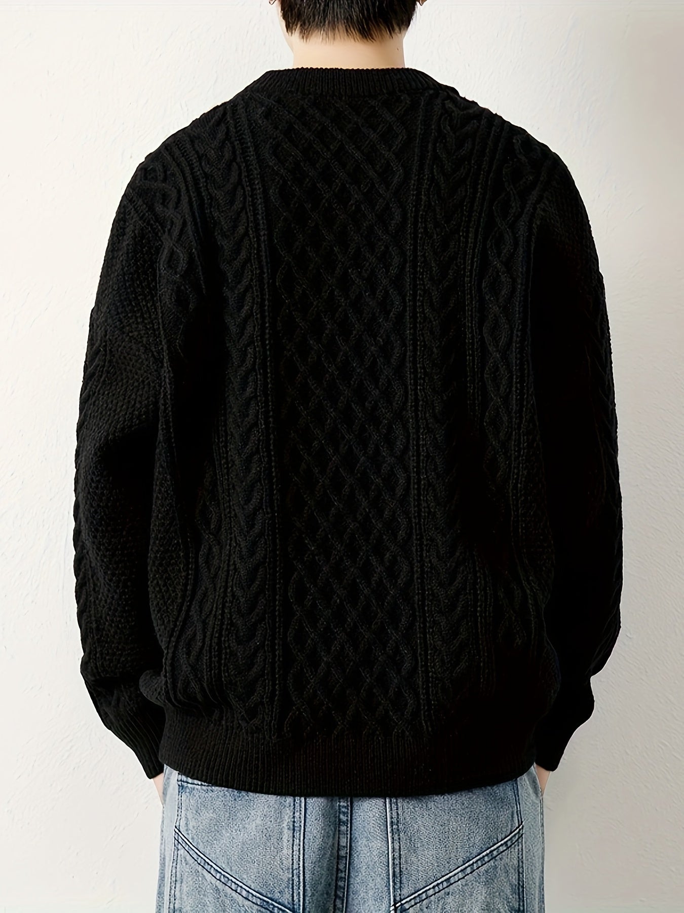 Cozy men's cable knit jumper, perfect for casual warmth and stylish appeal.