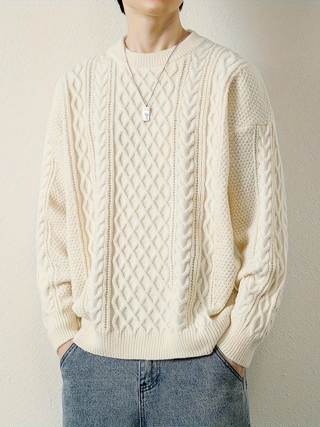 Stylish men's cozy cable knit jumper, perfect for cool weather.