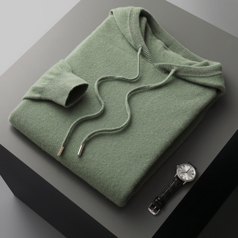 Relaxed fit men's pullover hoodie, sustainably designed for cozy comfort and casual autumn style.