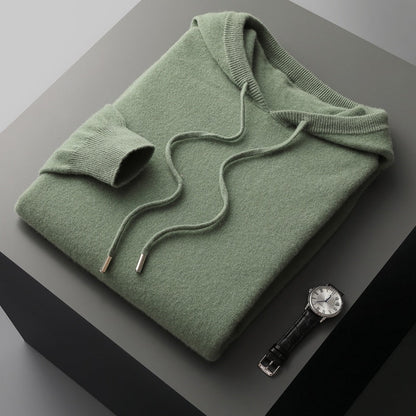 Relaxed fit men's pullover hoodie, sustainably designed for cozy comfort and casual autumn style.