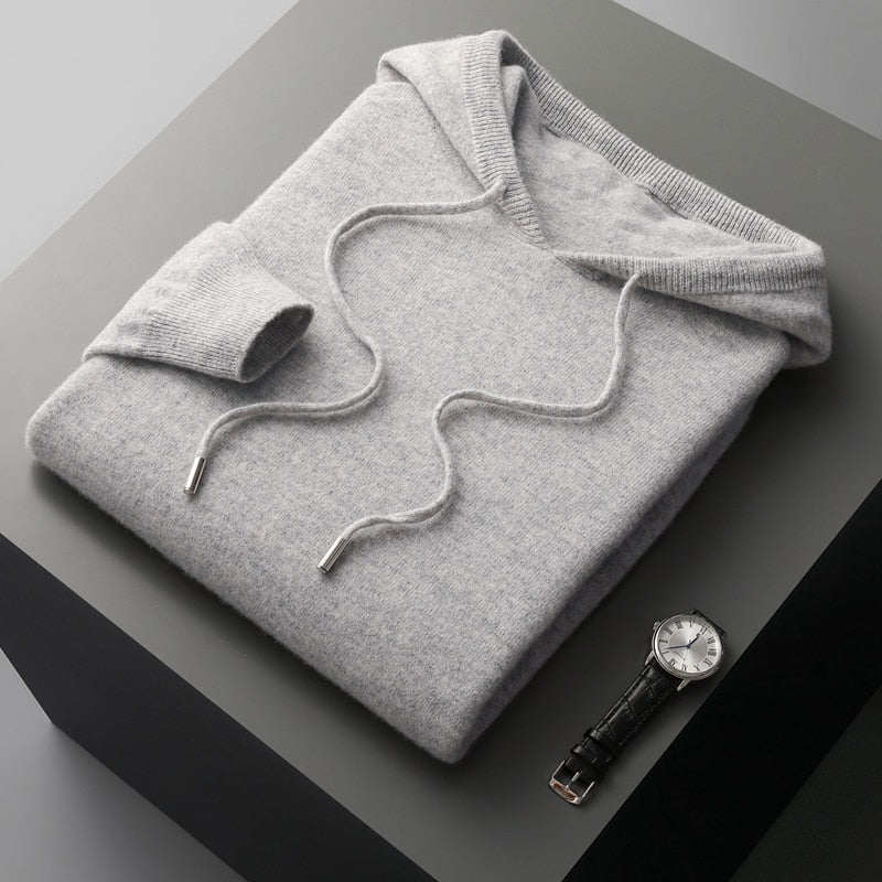 Stylish men's cozy pullover hoodie with relaxed fit, great for versatile layering and comfort.