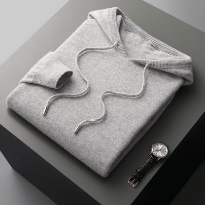 Stylish men's cozy pullover hoodie with relaxed fit, great for versatile layering and comfort.