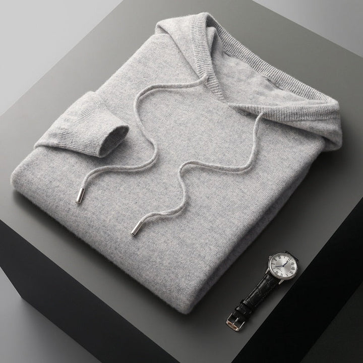 Stylish men's cozy pullover hoodie with relaxed fit, great for versatile layering and comfort.