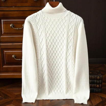 Stylish man wearing a classic diamond cable knit turtleneck sweater for cozy casual wear. Winter fashion.