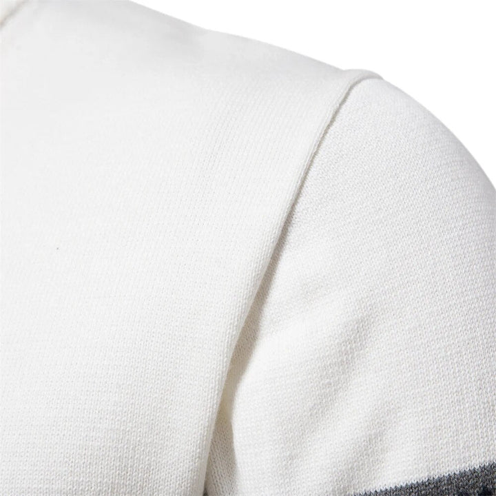 Men's stylish Nordic half-zip pullover. Cozy patterned knit sweater, perfect for warm winter casual wear.