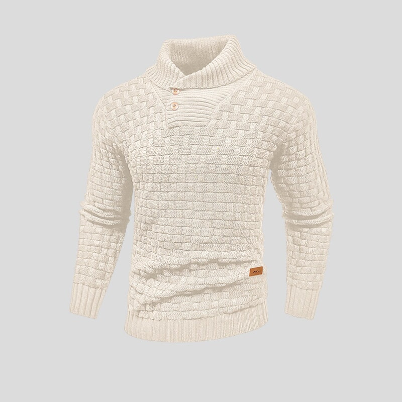 Man models stylish gray Oslo pullover sweater. Warm, cozy knit long sleeve for casual fall and winter outfits.