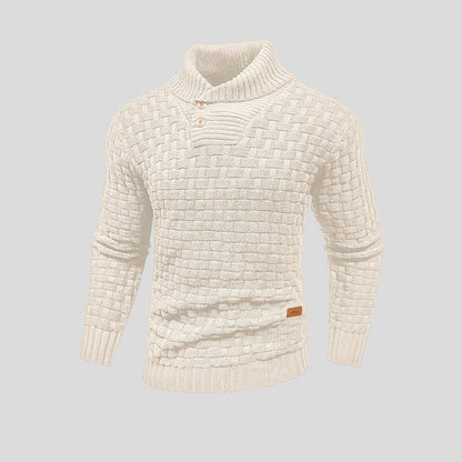 Man models stylish gray Oslo pullover sweater. Warm, cozy knit long sleeve for casual fall and winter outfits.