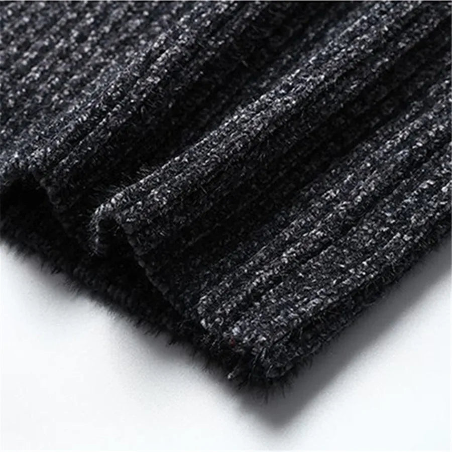 Man wearing a comfortable men's roll neck sweater, showcasing casual yet elegant winter style.