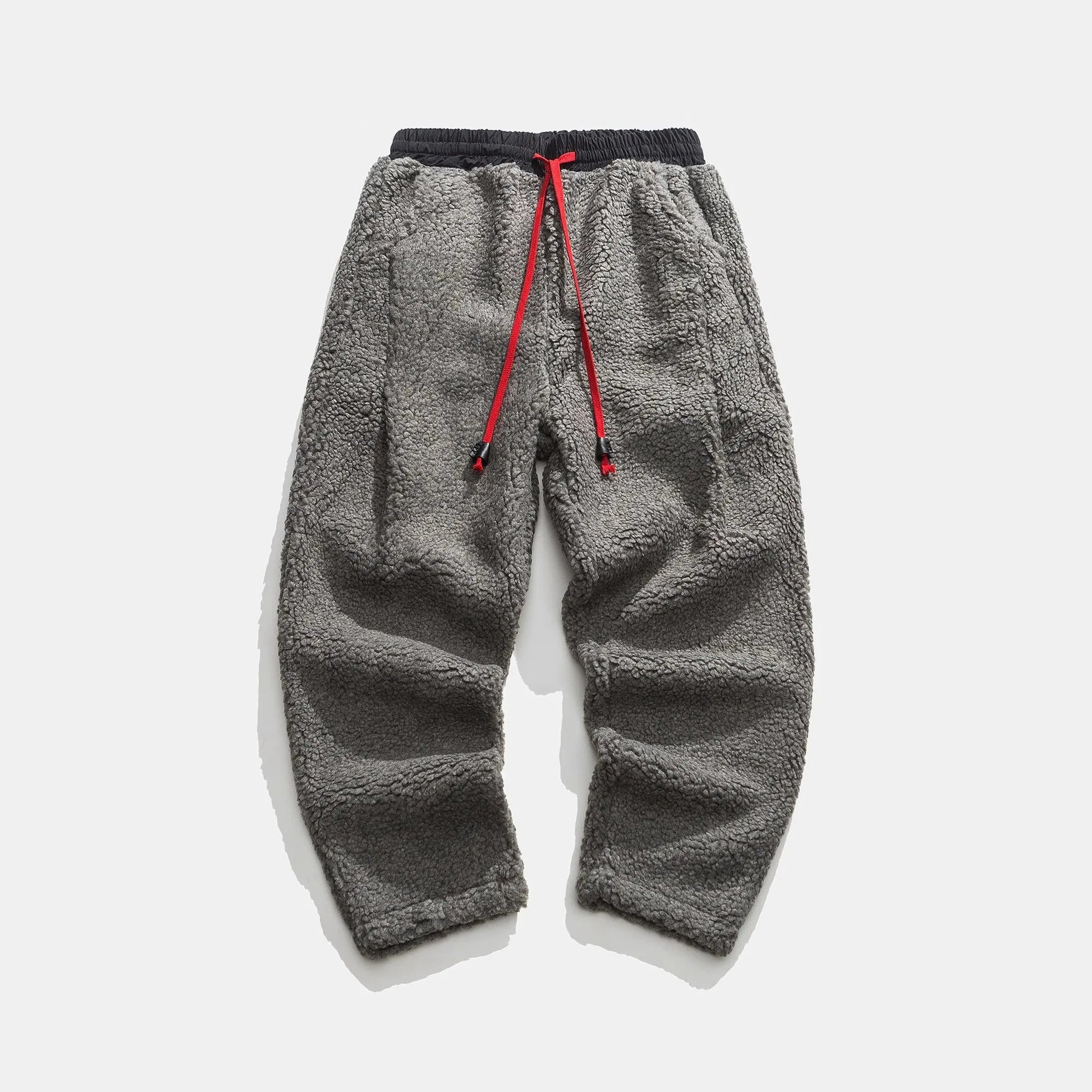 Warm men's sherpa winterwear sweatpants, offering supreme coziness and a stylish look for cold days.