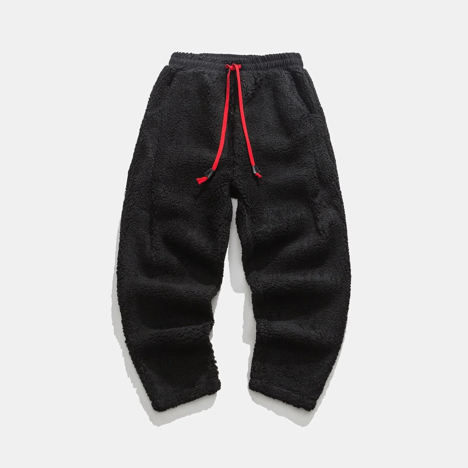 Modern men's sherpa joggers for streetwear fashion, combining comfort with a trendy activewear aesthetic.