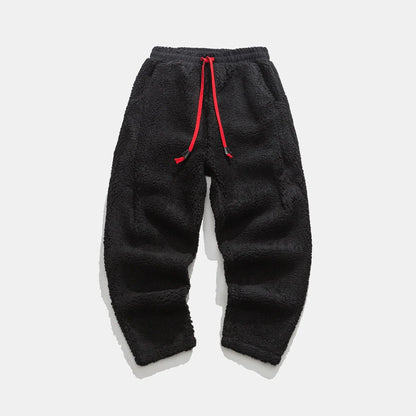 Modern men's sherpa joggers for streetwear fashion, combining comfort with a trendy activewear aesthetic.