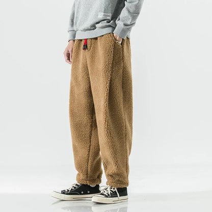 Plush sherpa men's joggers, providing ultimate warmth and a comfortable feel for home or outdoor wear.
