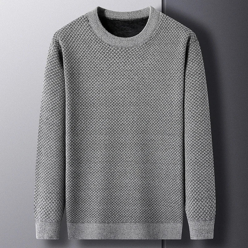 Men's cozy textured knit sweater, perfect for versatile fall and winter style. Long sleeve pullover.