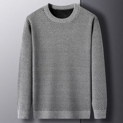 Men's cozy textured knit sweater, perfect for versatile fall and winter style. Long sleeve pullover.