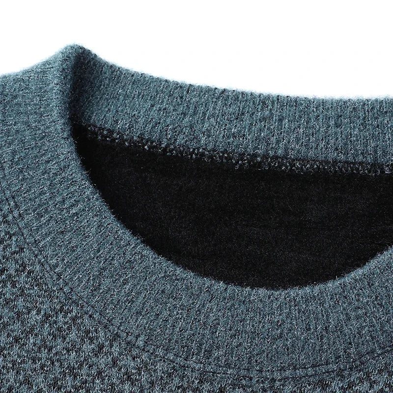 Fashionable men's textured knit sweater. Cozy long sleeve pullover for versatile casual wear.