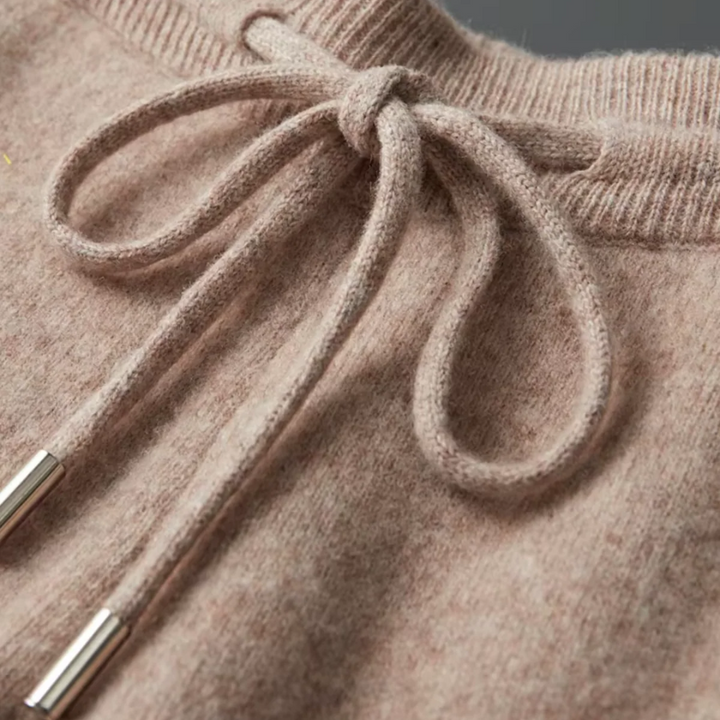 Relaxed fit men's lounge set: cozy zip-up sweater & drawstring pants, ideal for travel or casual wear.