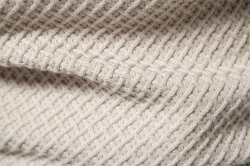 Casual men's waffle knit pullover, a cozy and stylish layering piece.
