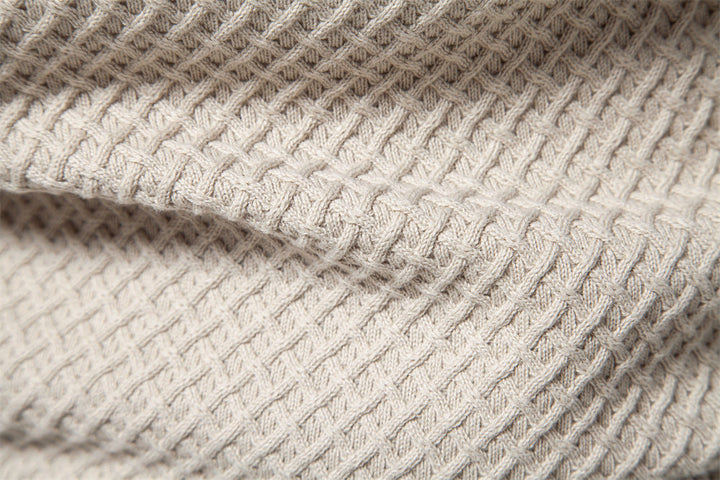 Casual men's waffle knit pullover, a cozy and stylish layering piece.