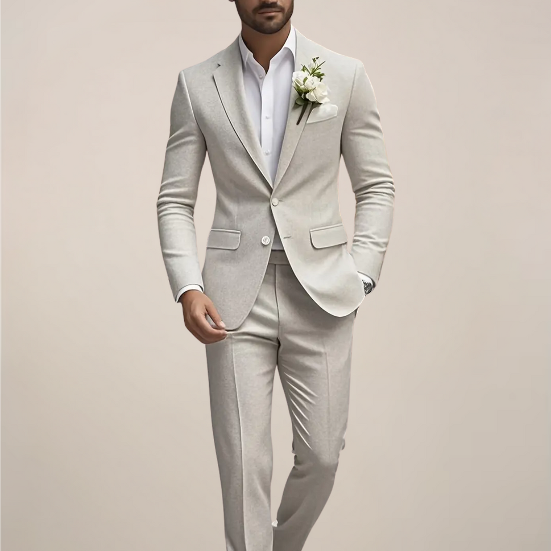 Men's cream slim fit wedding suit. Tailored formal wear perfect for groom attire & urban summer weddings.