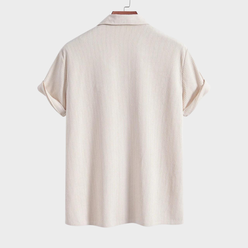 Stylish men's casual shirt: short-sleeve, Cuban collar, and textured corduroy, suitable for warm weather.