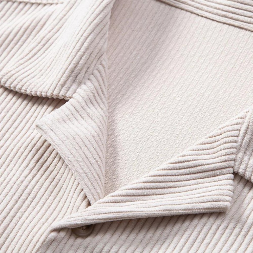 A versatile men's corduroy shirt in a casual Cuban collar design, perfect for summer and relaxed style.