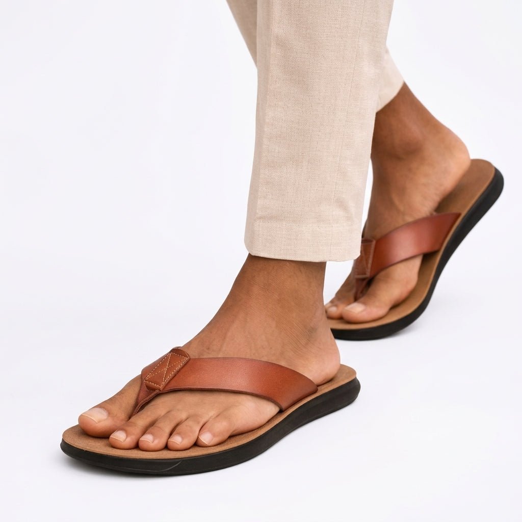 Comfortable men's toe post sandals featuring a soft, cushioned sole. Perfect for warm weather casual and everyday wear.