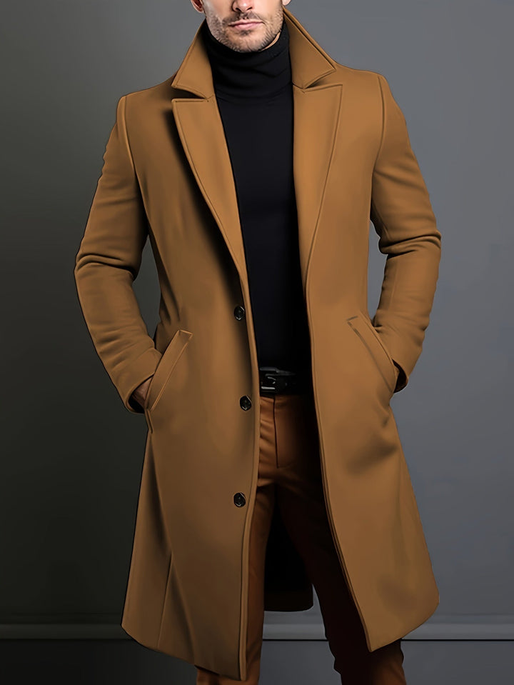 Classic black long overcoat for men. Single-breasted lapel design, perfect for fall & winter tailored looks.