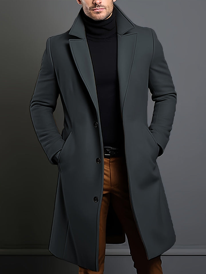 Sophisticated gray men's single-breasted lapel overcoat. Long winter coat for business and casual wear.