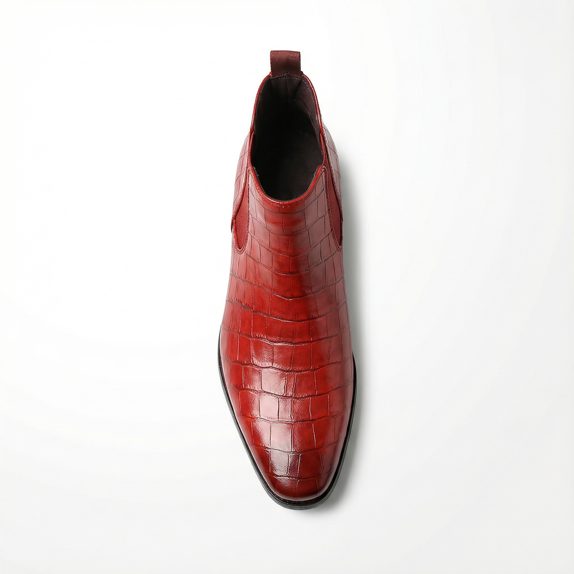Front view of premium genuine leather men's Chelsea boots, highlighting craftsmanship and elegant toe.
