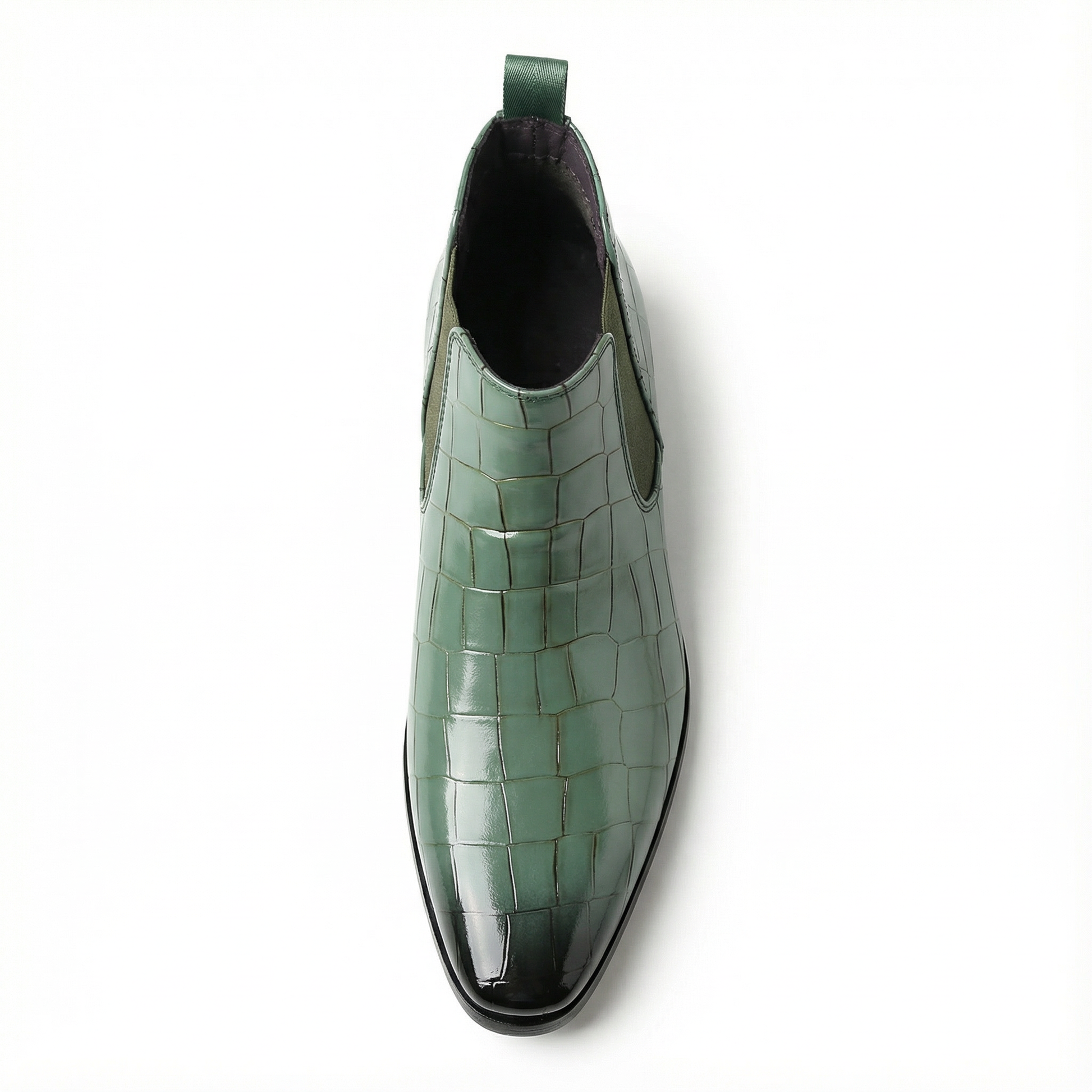 Pair of stylish men's brown leather Chelsea boots, perfect for urban adventures or polished dress wear.