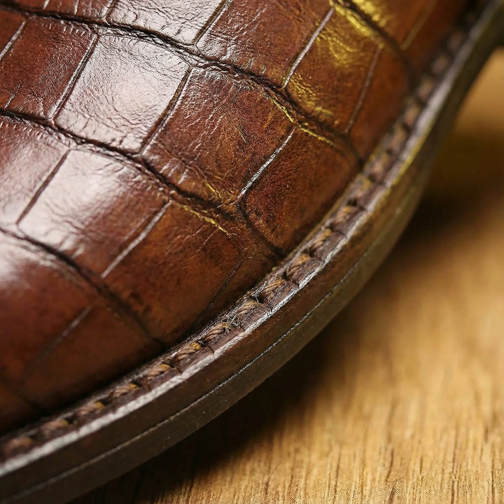 Versatile men's leather dress boots, styled as Chelsea boots for both casual and formal urban looks.