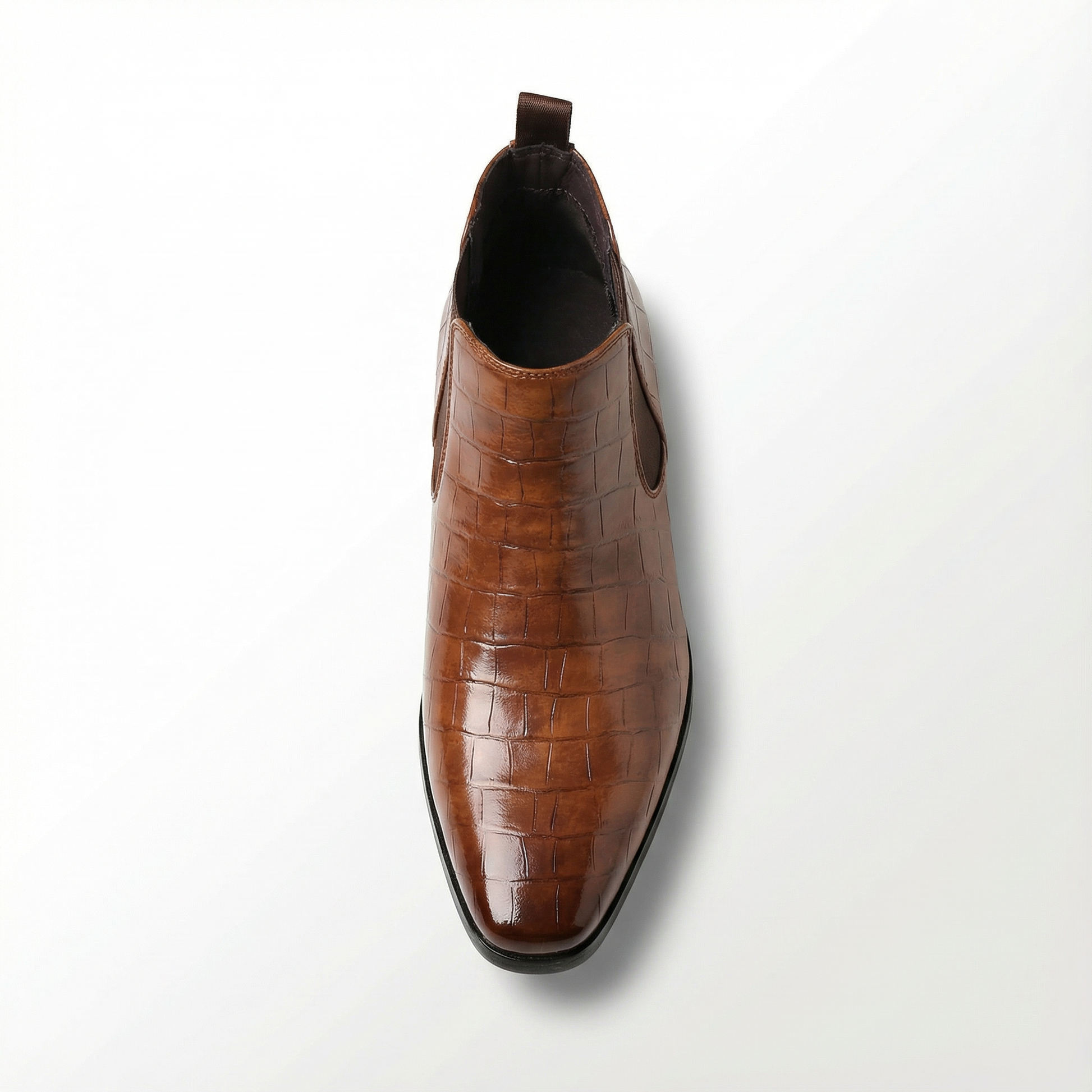 Men's ankle-high leather Chelsea boots in dark brown, a stylish & comfortable choice for urban explorers.